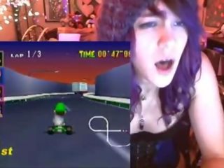 Geek femme fatale cums playing Mario Kart